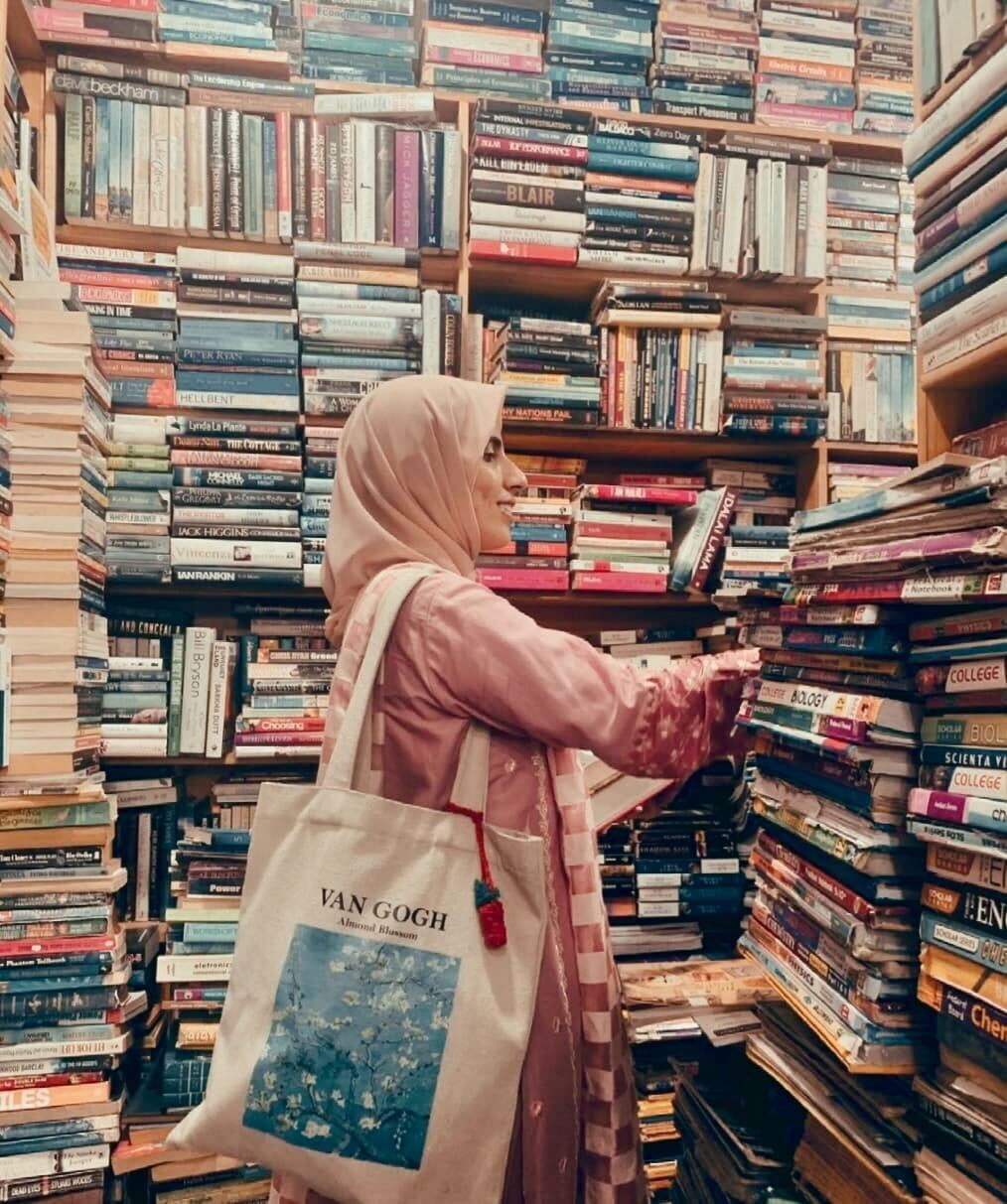 Zainab browsing books at her favourite bookstore